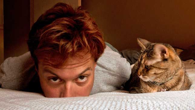 What Does a Cat’s Behavior of Sleeping Right Next to You Reveal?